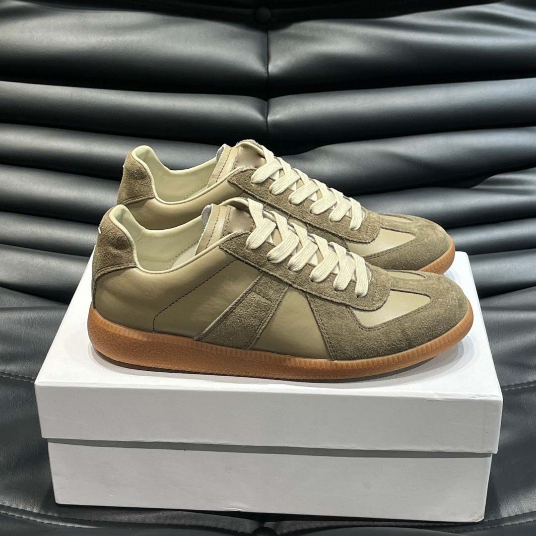 Estación europea 2025 nuevos zapatos de entrenamiento alemanes para hombres y mujeres zapatos planos casuales de todo fósforo zapatos de pareja con cordones de cuero zapatillas de deporte