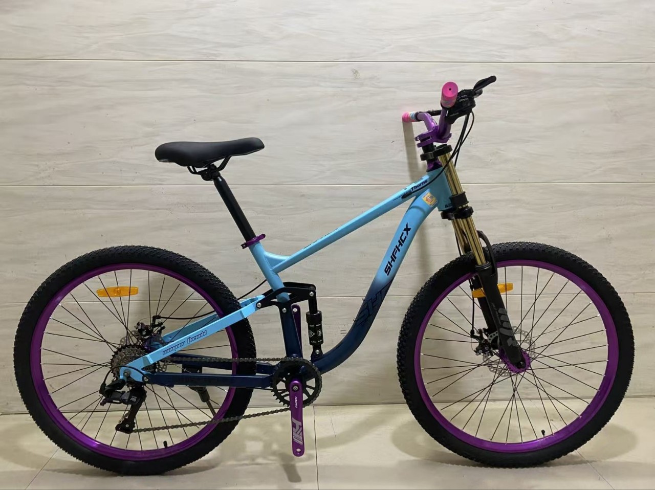 Fábrica al por mayor de bicicletas de montaña de cola suave para adultos bicicletas para hombres y mujeres doble amortiguación de carretera 26 pulgadas