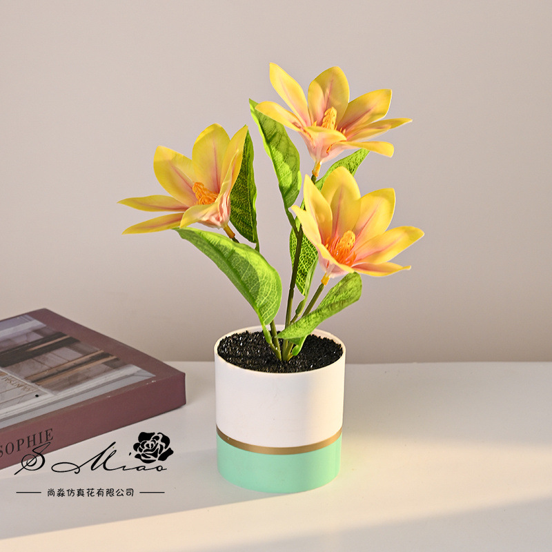 Transfronterizos tres cabezas sensación de mano magnolia bonsai creativo flores de simulación decoración de estudio en el hogar adornos verdes artificiales maceta