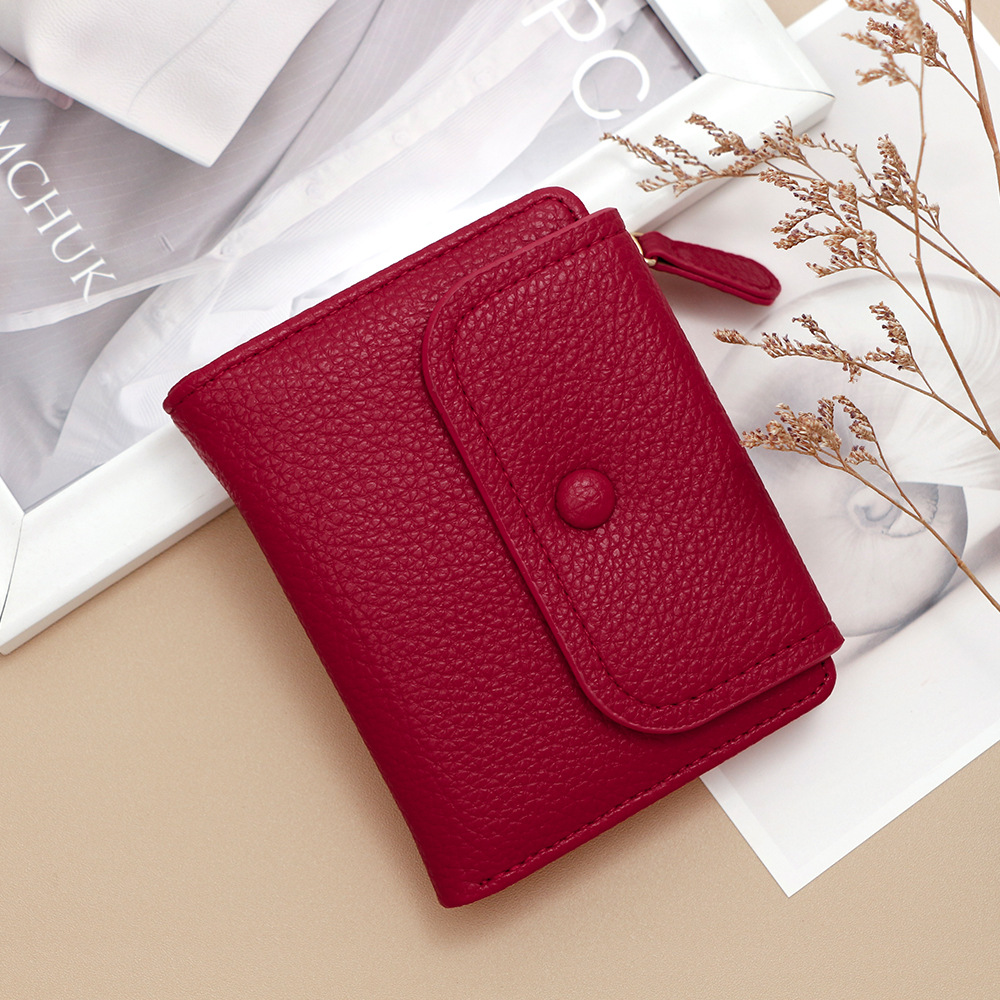 Nuevo cross-border cremallera bolso de cambio nicho creativo multifuncional bolso de tarjetas de moda litchi patrón corto para mujeres