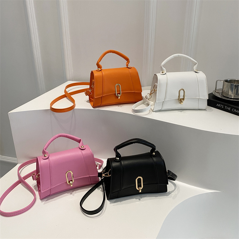 Bolso de mano coreano 2025 primavera nueva bolsa de moda de mujer con bloqueo de moda bolso de hombro simple de viaje