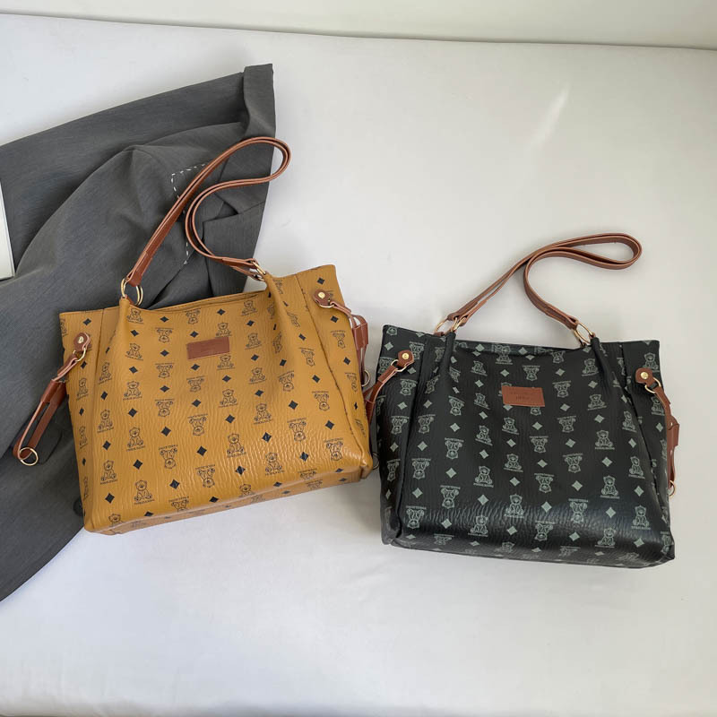 Retro 2025 nuevo estilo de moda de viaje de hombro bolso de brazo de mujer textura universal bolso de mano gran capacidad