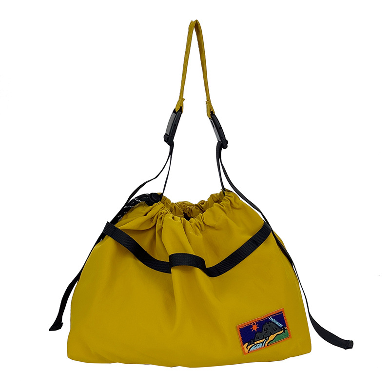 Bolso de hombro para bebé coreano de gran capacidad Bolso de mensajero para niños con cordón de aire extranjero Bolso para niños de viajes deportivos de ocio