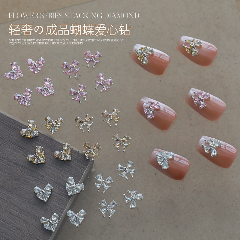 Love bowknot aleación manicura pila de diamantes productos terminados celebridades de Internet nuevas decoraciones de uñas de diamantes de pila súper flash al por mayor