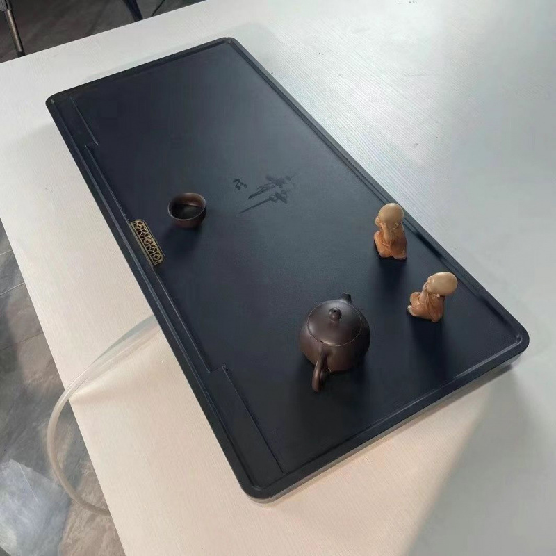 Nuevo tipo de mesa de té sintética de piedra de oro integral imitación de piedra doméstica oficina moderna simple drenaje directo