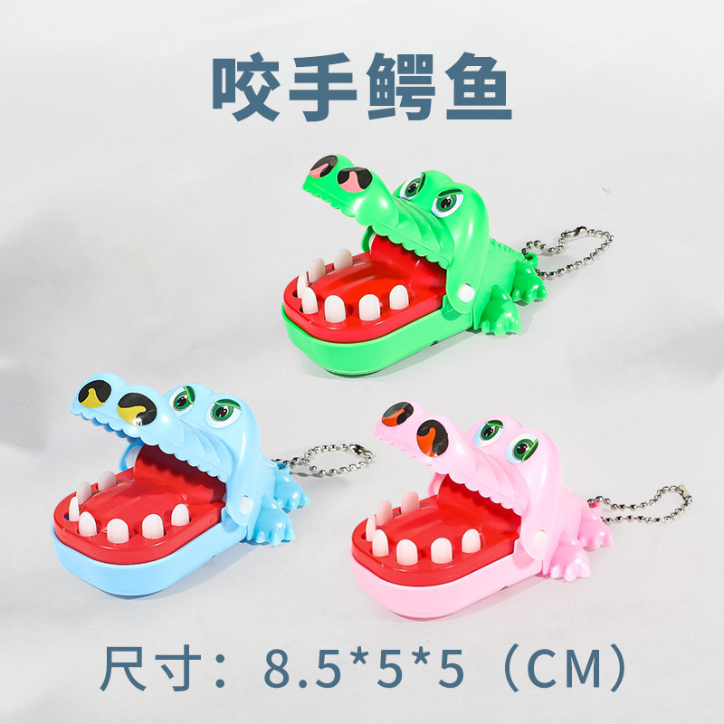 Cocodrilo pequeño muerde juguetes de dedo ballena juegos de extracción de dientes cocodrilo padres e hijos muerde juguetes de hechicería para niños al por mayor