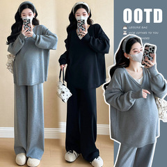 妊婦2025春の怠惰な風のファッションの洋風はやせているスーツのニットのセーターの広い足のズボンの妊婦の2つのセットを現します。