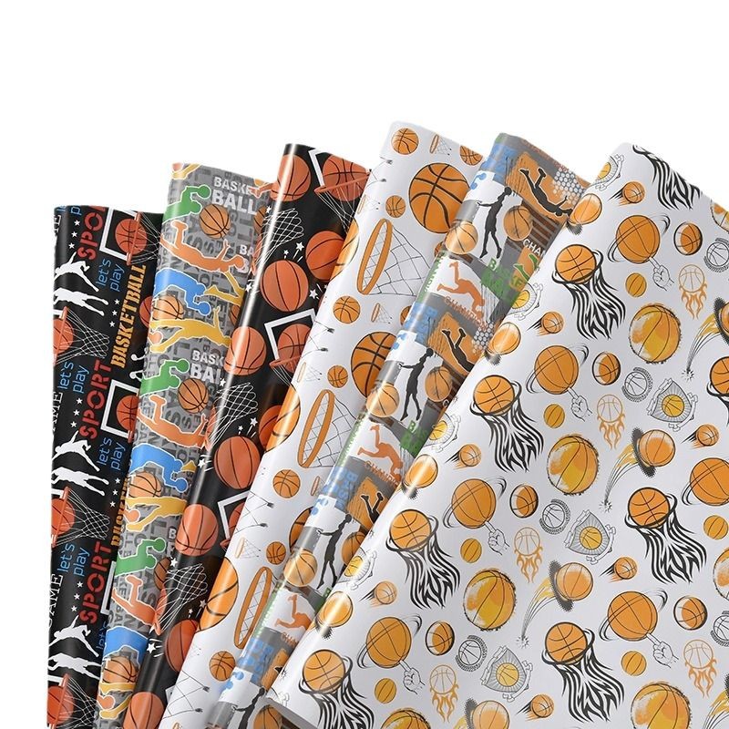 Nuevo papel de embalaje de regalos de dibujos animados transfronterizos día de los niños serie de baloncesto de fútbol papel de embalaje de regalos al por mayor