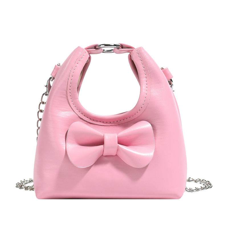 Dolce y lindo arco de hombro de niñas bolso de cadena mini pequeño bebé bolso de mano bolso de comercio exterior transfronterizo bolso de niños