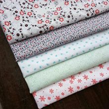 涤纶梭织花布布料 箱包服装里布口袋布 平纹桃皮绒卡通印花布料