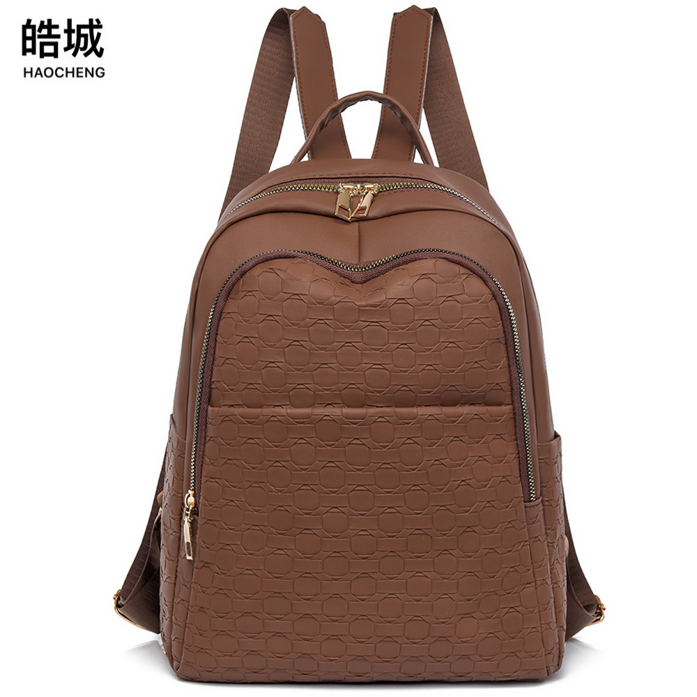 Bolsos para mujer 2024 nuevo diseño de nicho para mujer mochila simple y versátil mochila de viaje de cercanías urbana al por mayor