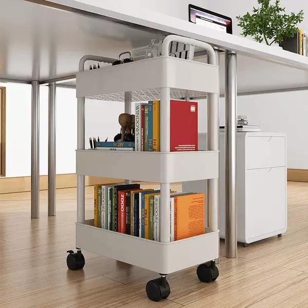Office work desk under the bookshelf shelf beside the table bookcase mobile storage wheeled snack trolley landing