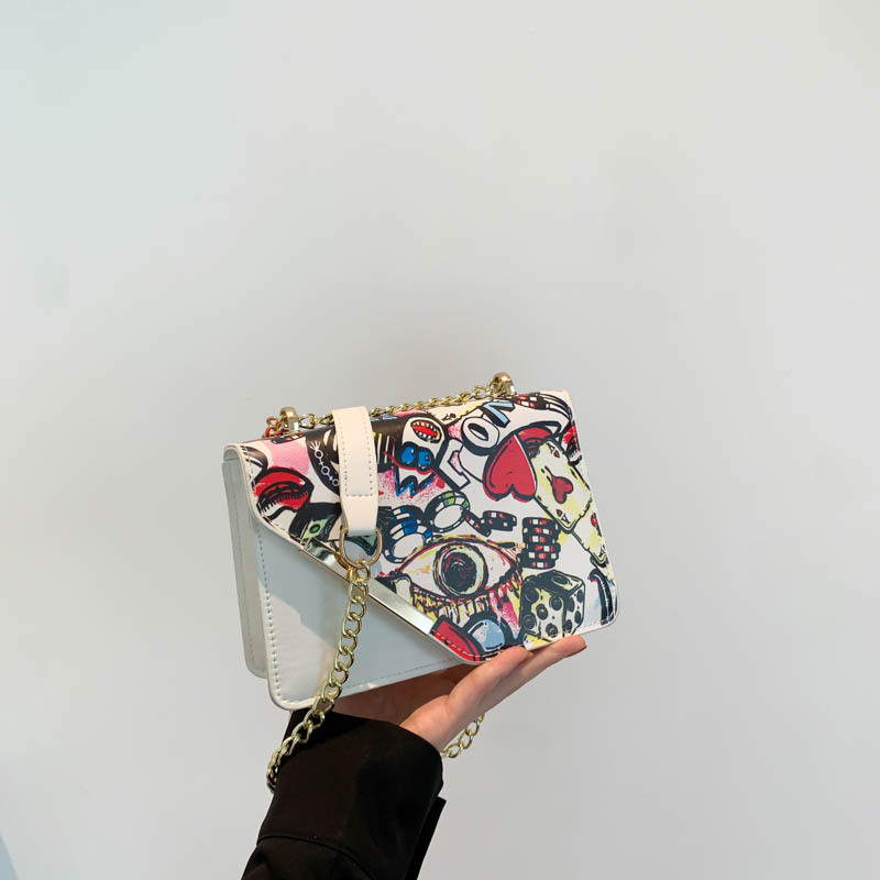 Moda personalidad graffiti impresión bolso de hombro 2024 nuevo nicho de diseño coreano cadena elegante bolso de hombro