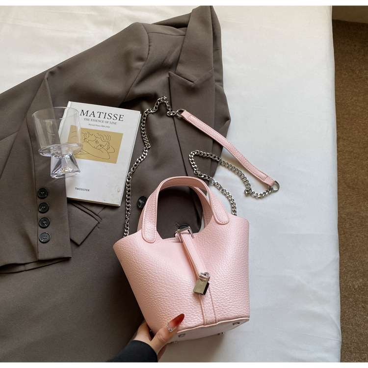 Bolso de madre de cubo de ocio simple para mujer 2025 versión coreana del nuevo bolso de mensajero exquisito de textura de moda ins
