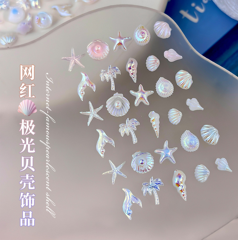 New Ocean Series Nail Art Accessories Mixed with Aurora Shells, Starfish, Conch, Coconut Tree, and Resin Nail Decorations New Ocean Series Nail Art Accessories Mixed with Aurora Shells, Starfish, Conch, Coconut Tree, and Resin Nail Decorations