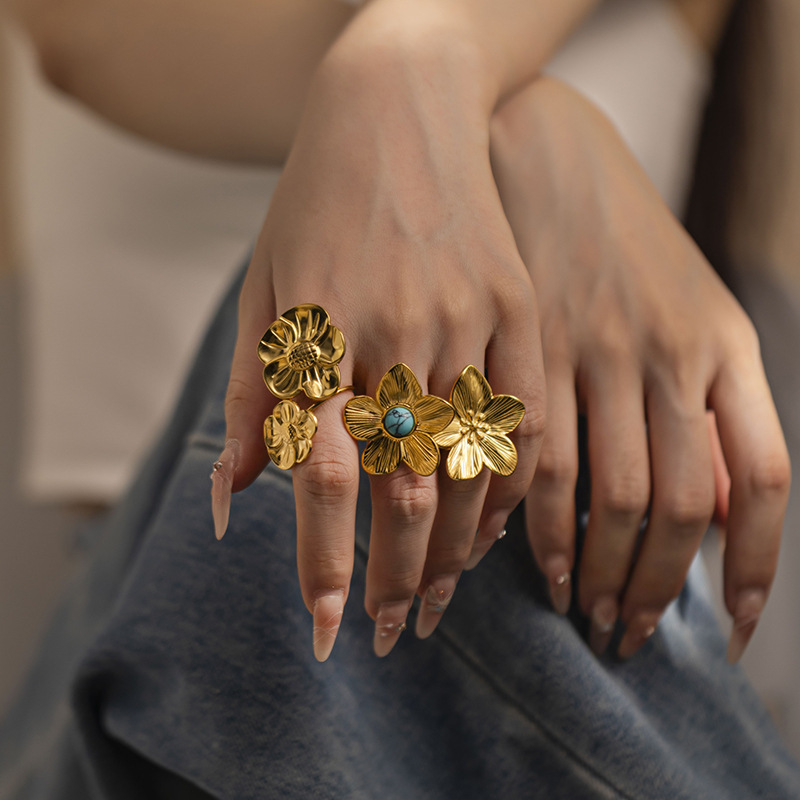 Anillo de acero de titanio universal TENA Europa y América nicho de diseño femenino anillo de flores anillo de acero inoxidable joyería de mano de alta calidad