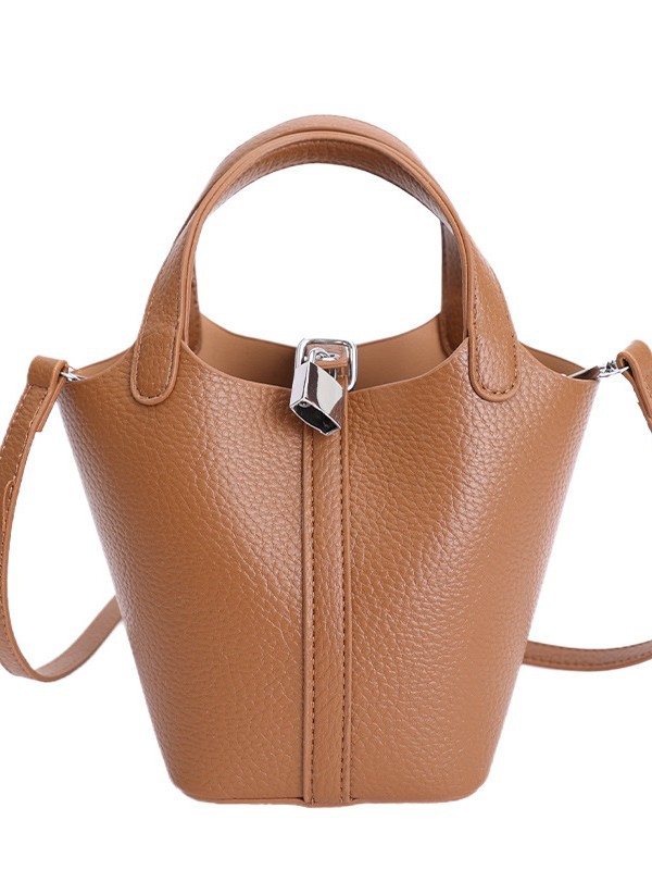Cestas clásicas de platos bolsas de cubo de mano nicho coreano de litchi de textura alta moda versátil bolso de mochila