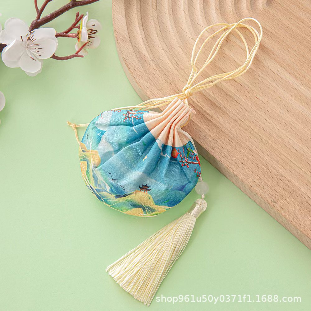 Mud gold-color printed sachet (with tassel)