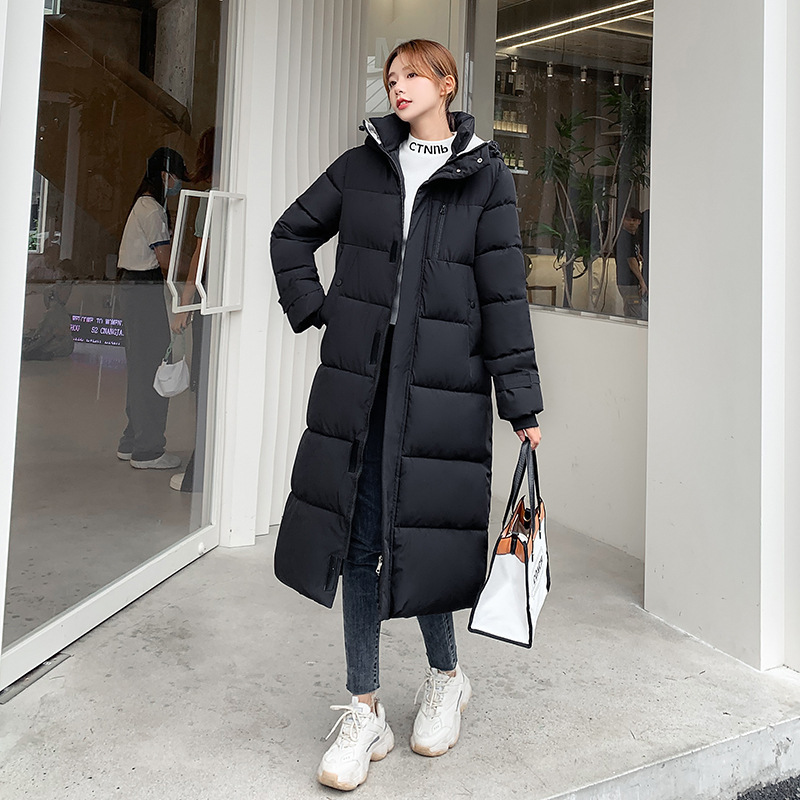 Nuevo comercio exterior 2023 ropa de algodón coreana mujer invierno largo encapuchado rodilla ropa de algodón damas gruesa abrigo de algodón blanco