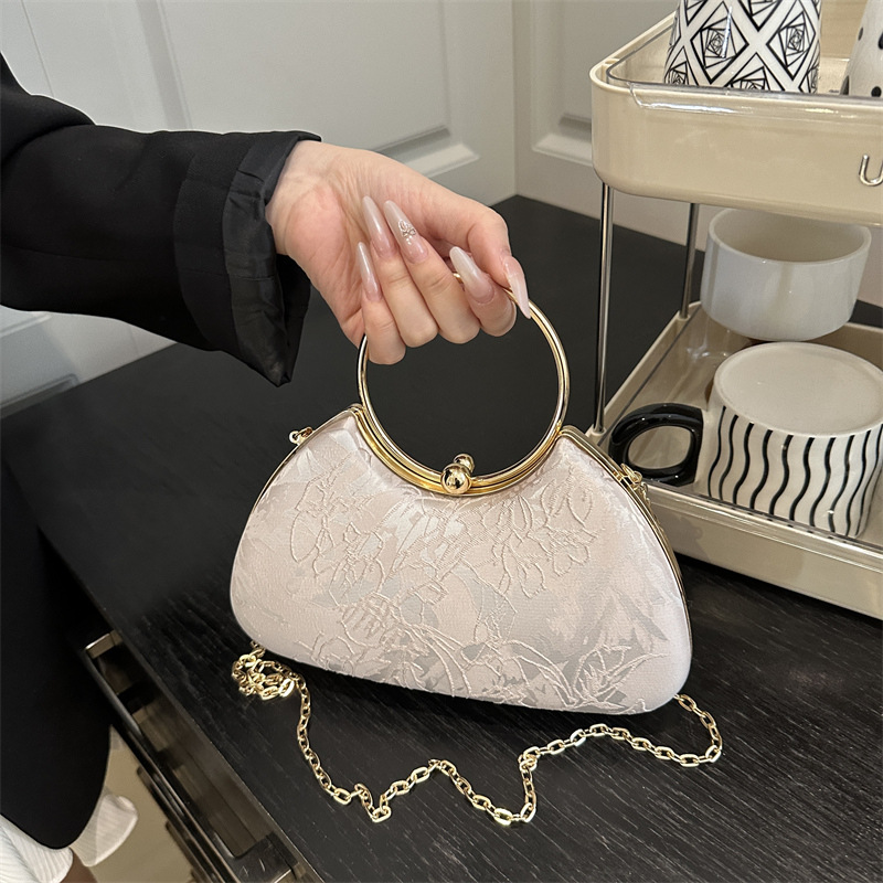 Bolso de cena de alta calidad bolso de mujer verano 2025 nuevo estilo bolso de mano estilo nacional estilo extranjero bolso de hombro universal