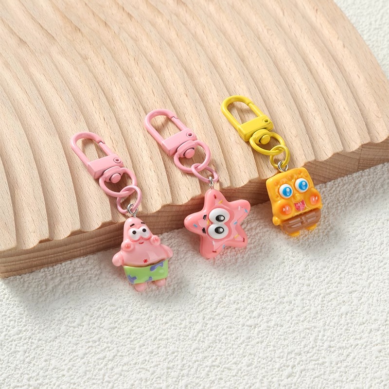 Caricatura encantadora SpongeBob pie estrella de resina llave auriculares colgantes bolsos accesorios amigos regalos