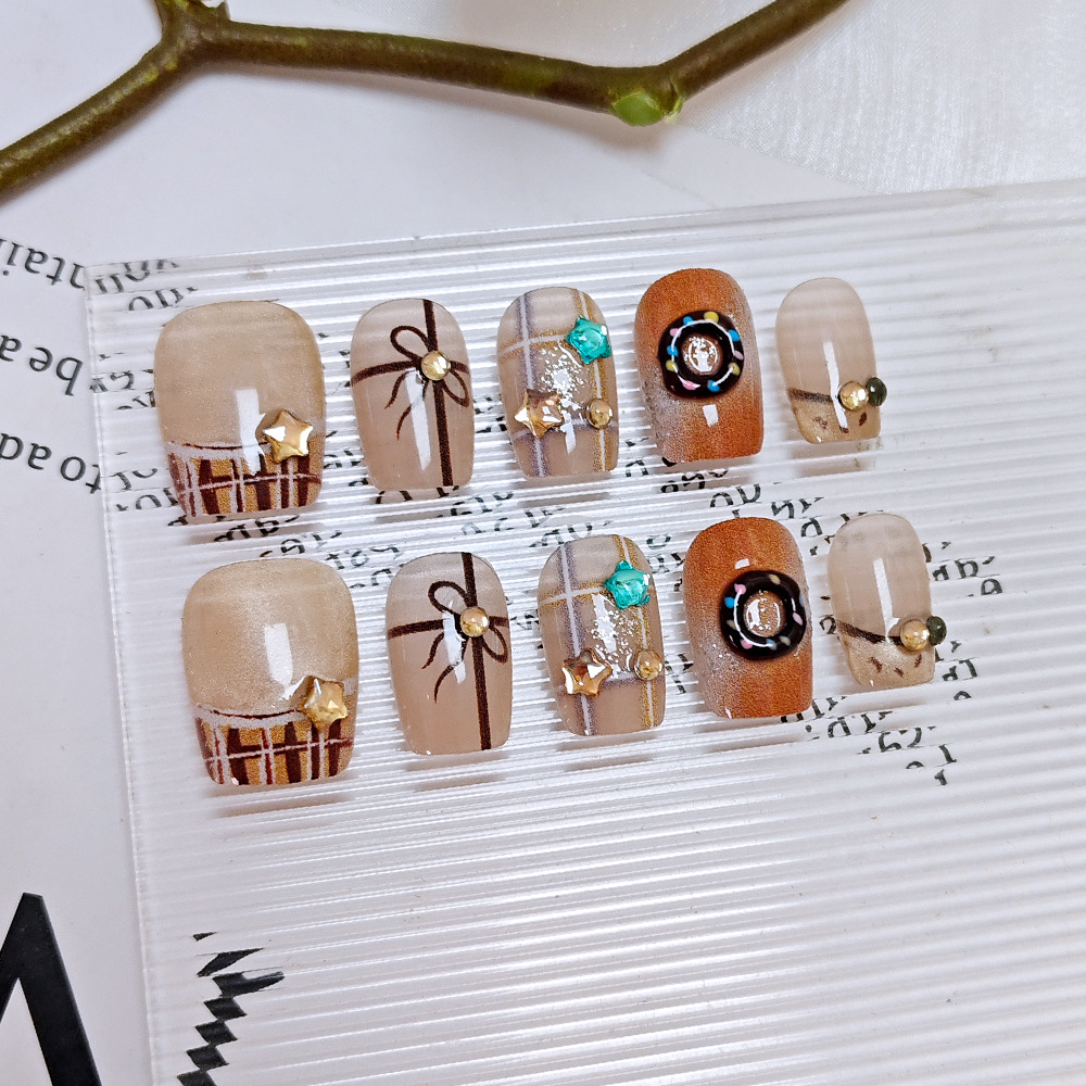 Arco a cuadrillas para usar uñas cortas, donut de diamante de estrella, manicura exquisita, 10 piezas de manicura falsa de ojo de gato.