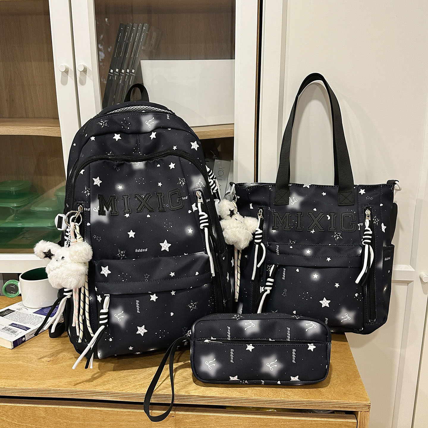 Black three-piece set with 2 black star and white fur rabbit pendants