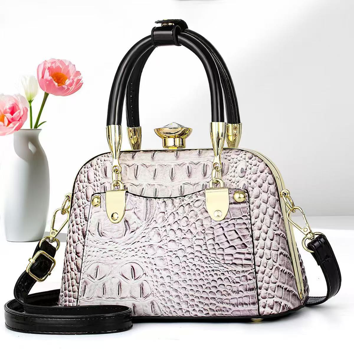 Bolsos de mujer verano nuevo estilo bolso de madre bolso de hombro de mediana edad bolso de mensajero de nicho de regalo de todo fósforo