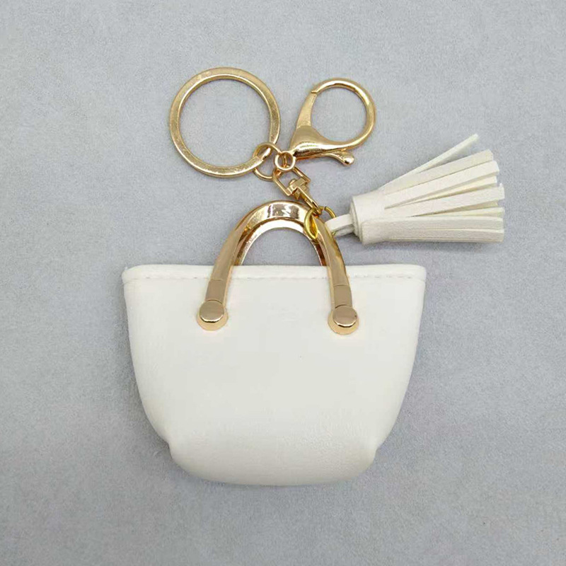 Llavero para mujer, bolso, colgante, joyería, mini monedero de almacenamiento de cuero lindo europeo y americano