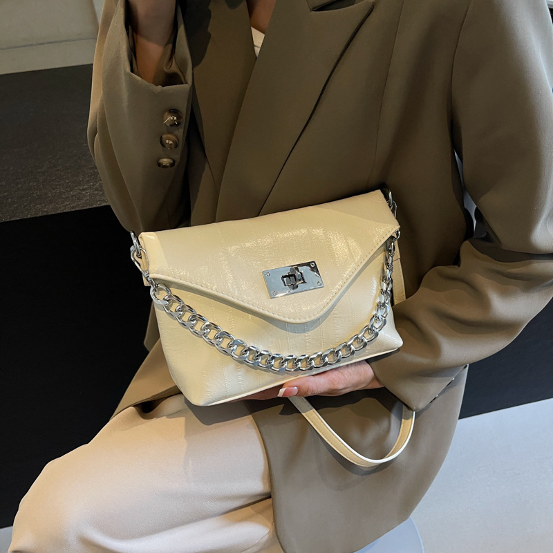 Bolso de textura transfronteriza 2025 verano nuevo bolso de cadena bolso de hombro de sentido avanzado bolso de mensajero a rayas simple mujer