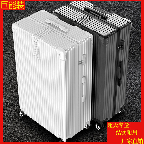 Big retro universal extra large suitcase on wheels