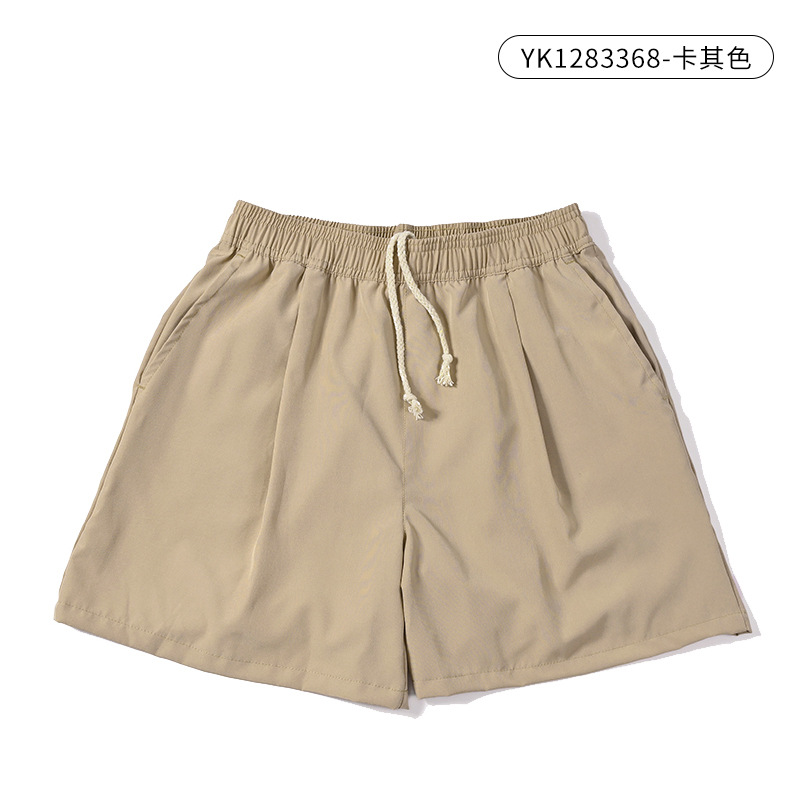 Pantalones cortos deportivos de secado rápido para mujer estilo delgado de verano 2025 nuevos pantalones de playa de pierna ancha sueltos simples y casuales