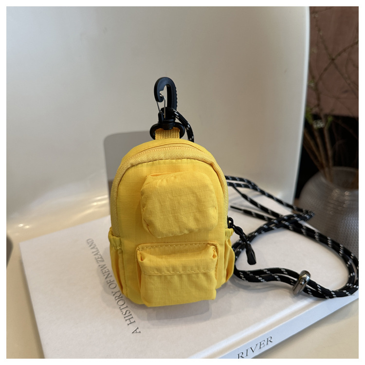 Mini colgante bolso de cambio 2025 nuevo cross-border nylon impermeable bolso de auriculares de bolsillo de hombro