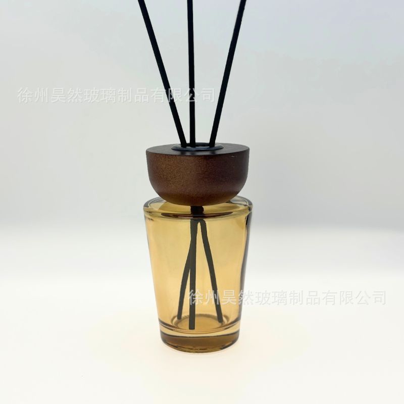 Botella vacía europea simple de alto valor nominal botella de fragancia de madera sólida botella de aceite esencial de caña cónica sin fuego 28 dientes botella de vidrio