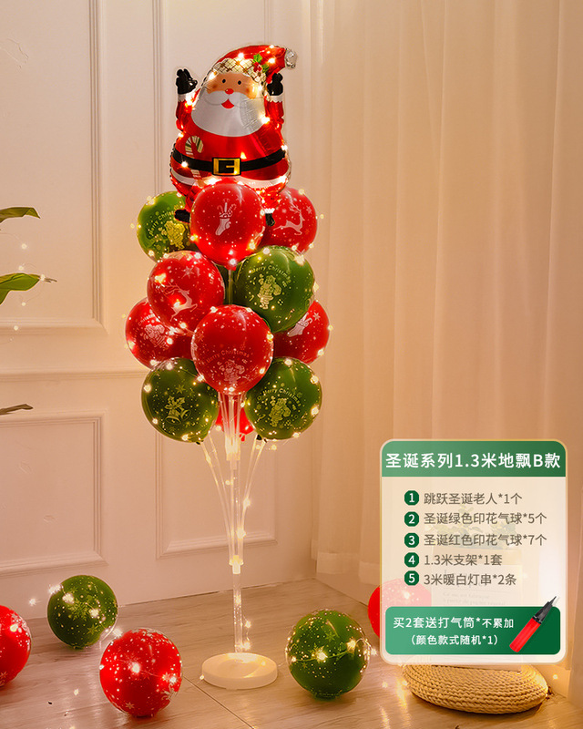 クリスマスの装飾が光るテーブルが風船を漂わせます。|undefined