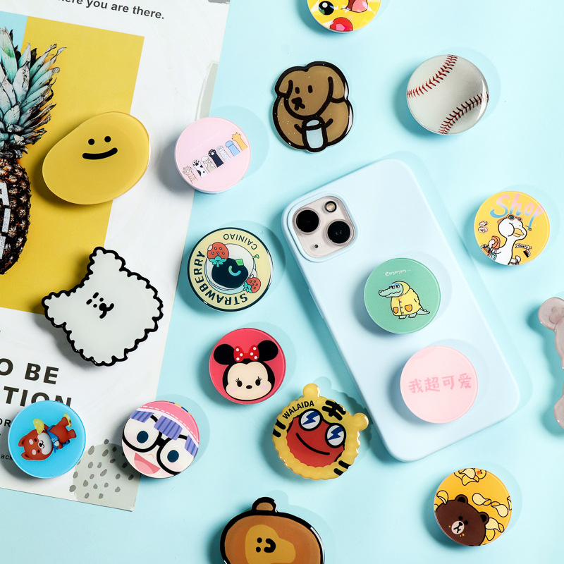 Soporte de airbag acrílico de forma alienígena al por mayor encantador alrededor de las estrellas de dibujos animados soporte de teléfono móvil en stock DIY