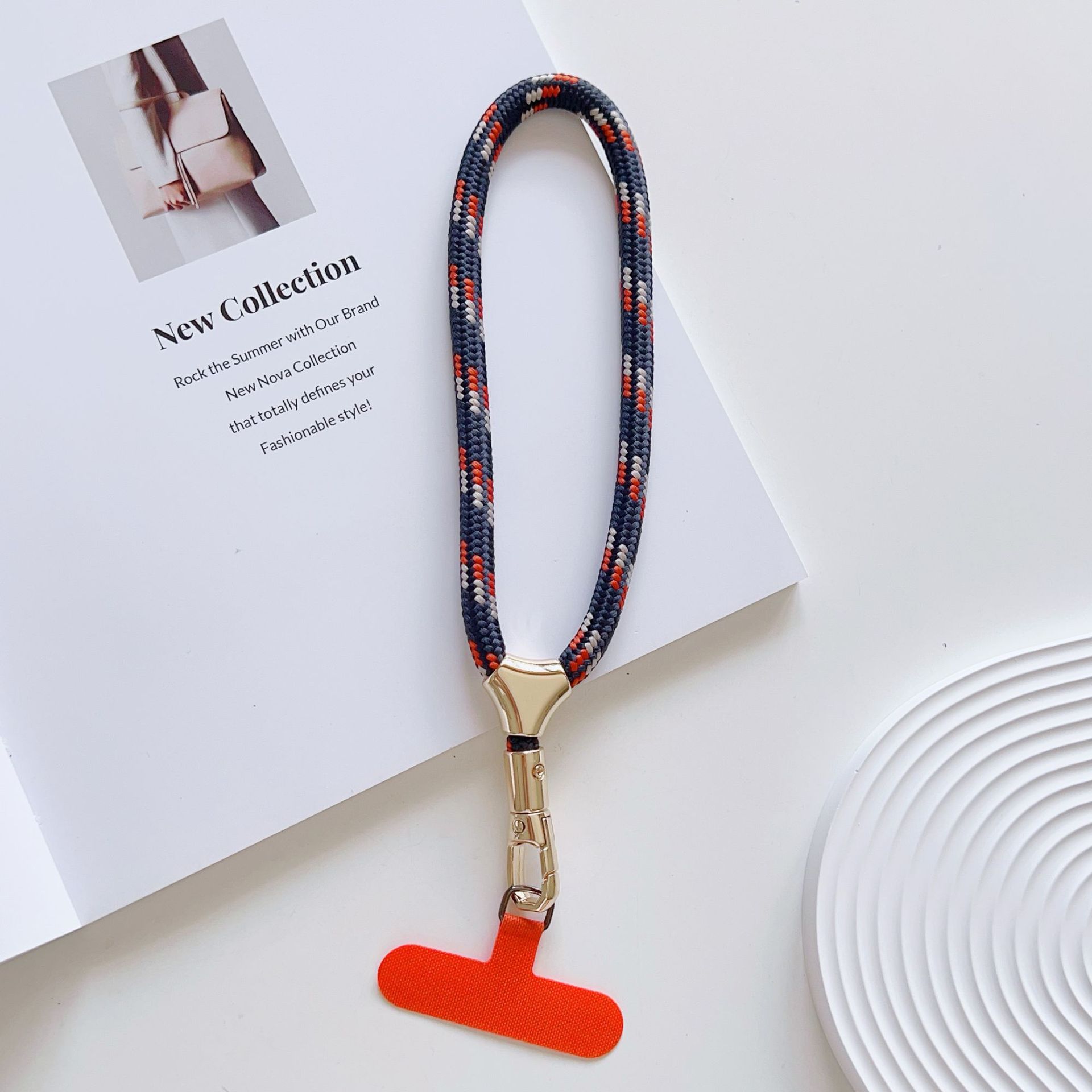 Cuerdas de muñeca ajustables de alta calidad con clips de hebilla pequeñas y frescas de poliéster corto para colgar teléfonos móviles simples y versátiles