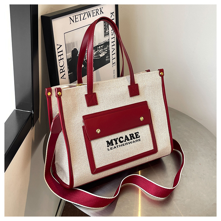 Bolso de lona de gran capacidad para mujeres 2024 nueva moda color contrastante empalme mochila de hombro simple bolsa de mano casual