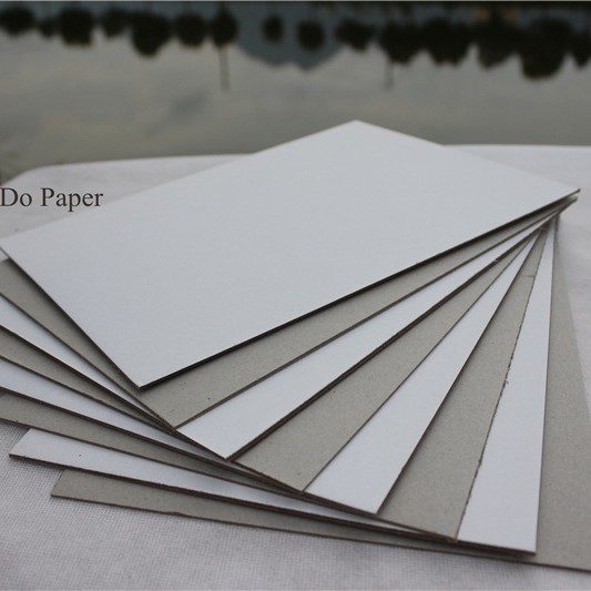 厂家直销 单面涂布白板纸 灰底白面实心硬纸板 拼图专用纸板