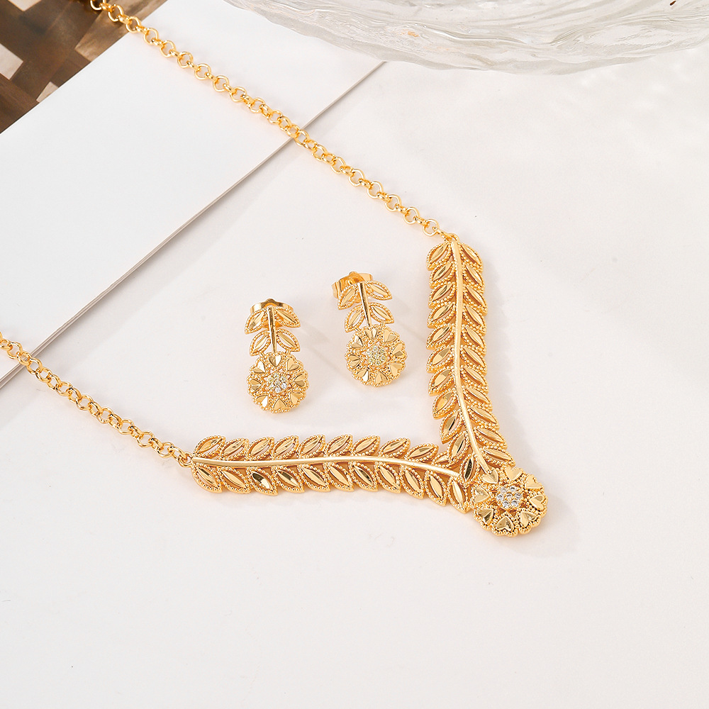 Europa y los EE.UU. collar de auriculares de bronce para mujeres joyas de piedra de zinc de moda de dos piezas de joyas elegibles transfronterizas