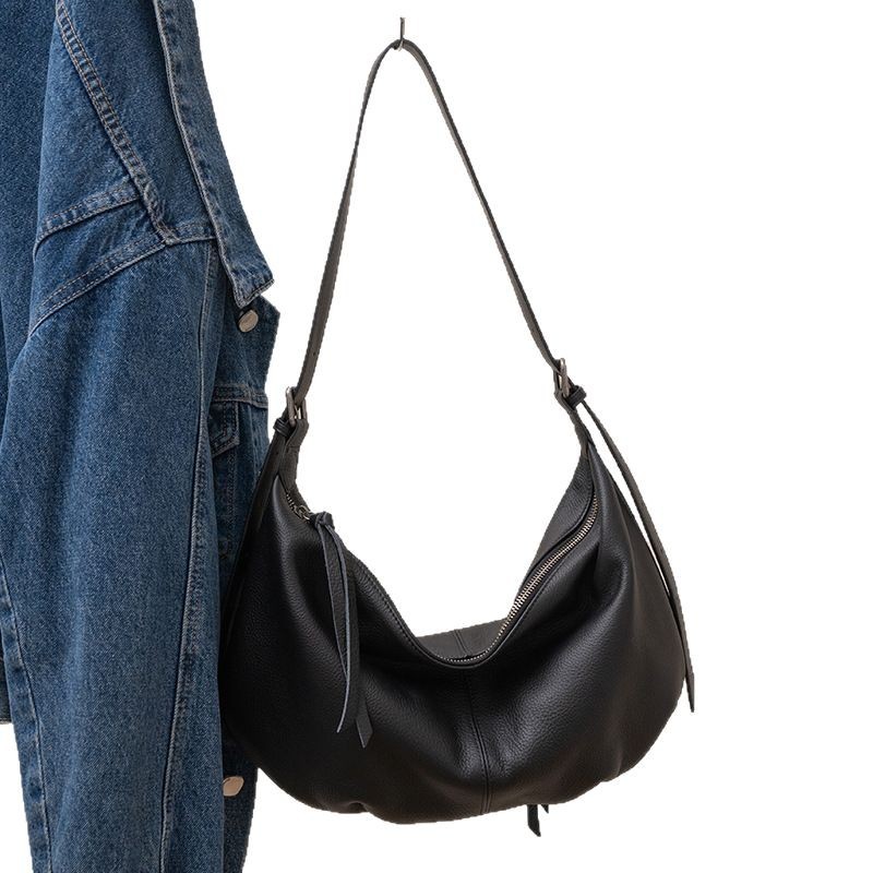 Bolso de mujer de cuero genuino bolso de mujer de gran capacidad 2025 nuevo bolso de albóndigas de cuero de vaca de primera capa con bolso de hombro único de cercanías