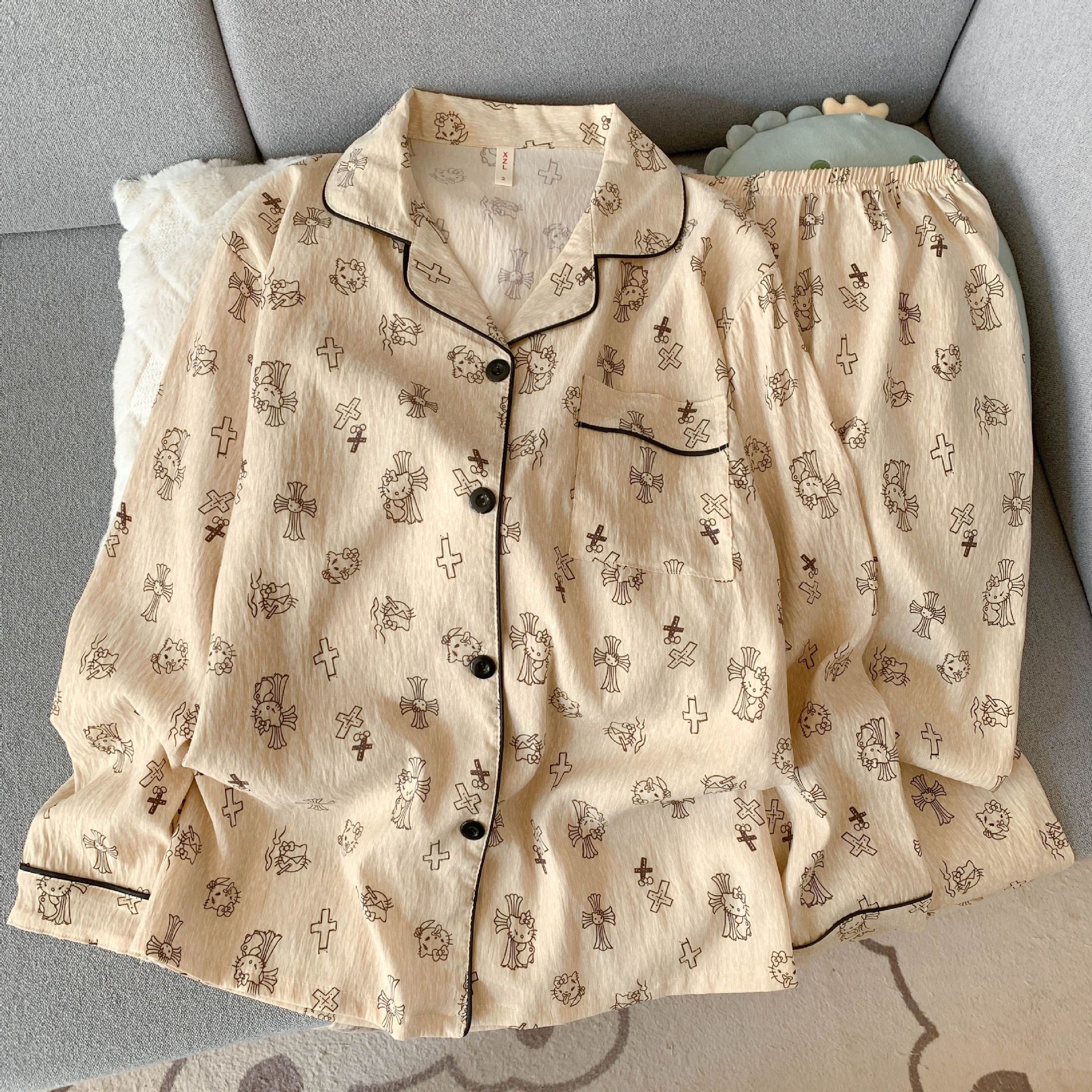 Al por mayor transfronterizo KT gato pijama mujer primavera y otoño nubes algodón manga larga 2026 nuevo juego de ropa de hogar encantadora super caliente