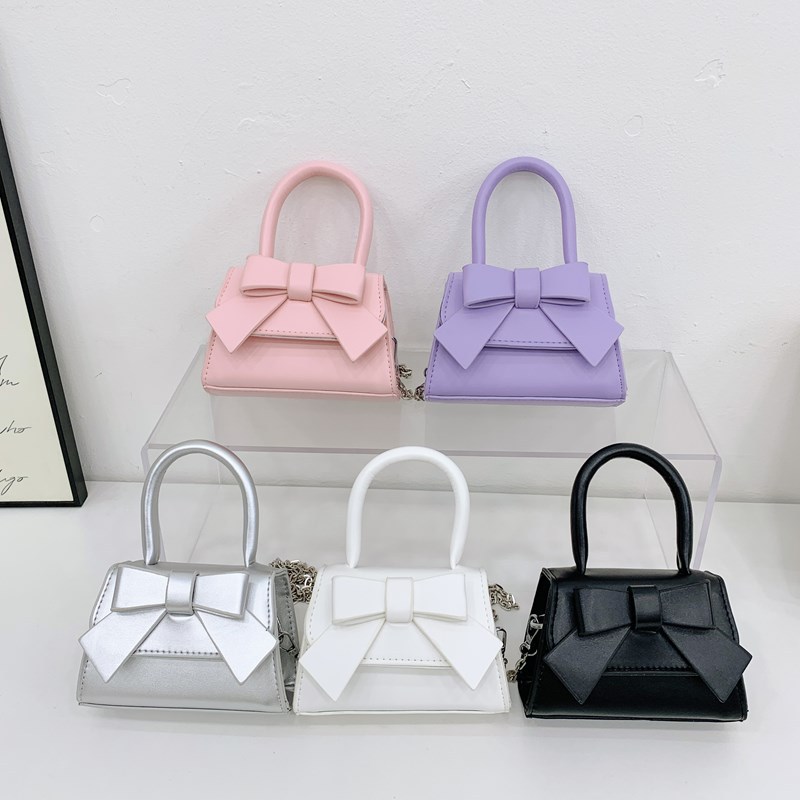 Bolso de princesa de estilo occidental Bolso de hombro para niña con lazo lindo de color sólido simple