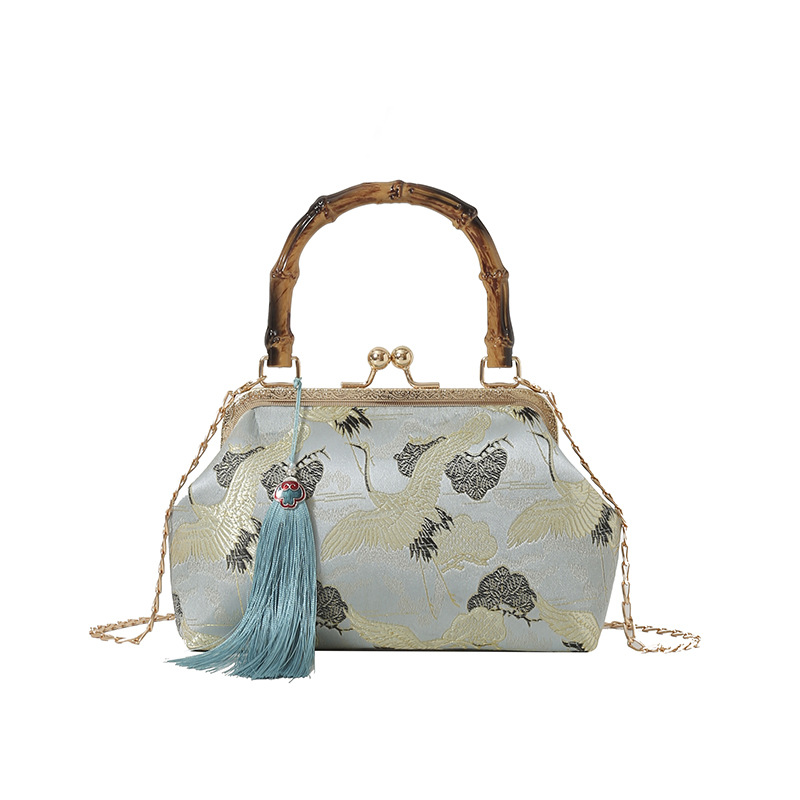Elegant Small Shell Bucket Bag With Tassel And Bamboo Handle_voghion.com