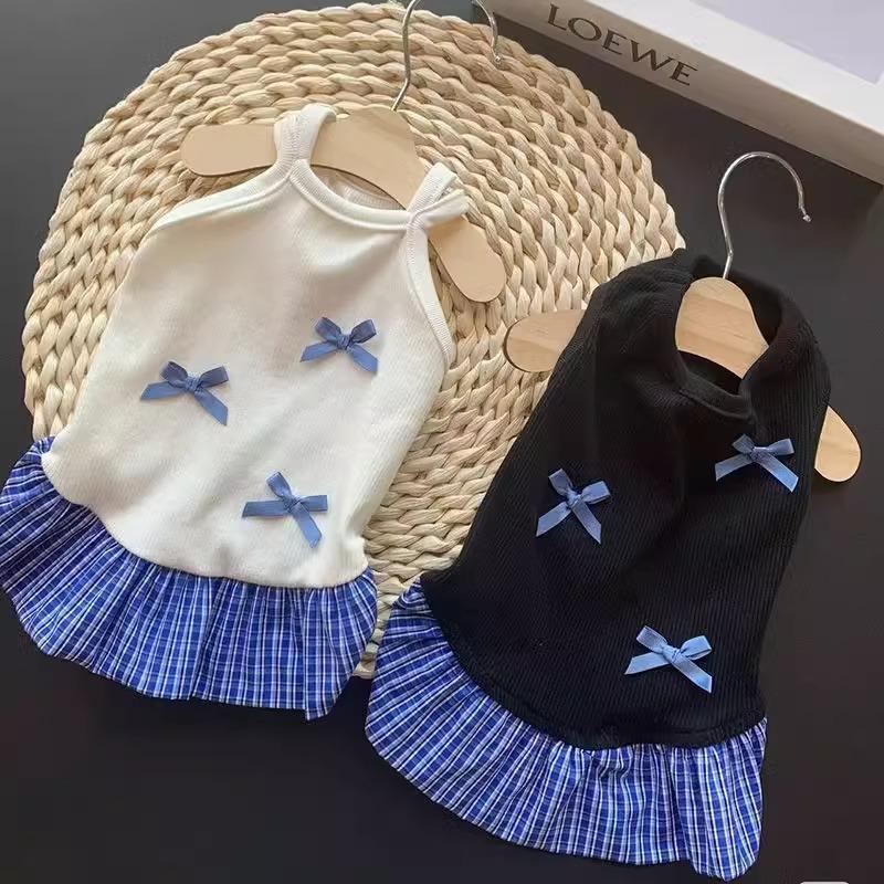 犬の服春の夏の新しい蝶結びのストラップはワンピースのテディをつづり合わせます。