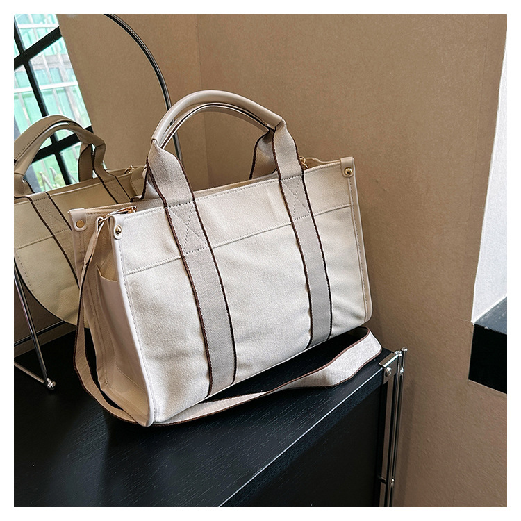 Bolso de lona de gran capacidad para mujer 2024 nuevo estilo coreano simple bolso de mensajero de un solo hombro bolso de viaje casual