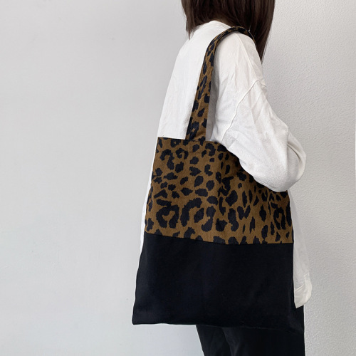 Autumn and winter new leopard print canvas bag women's single shoulder large capacity literary design ins tote bag student class bag