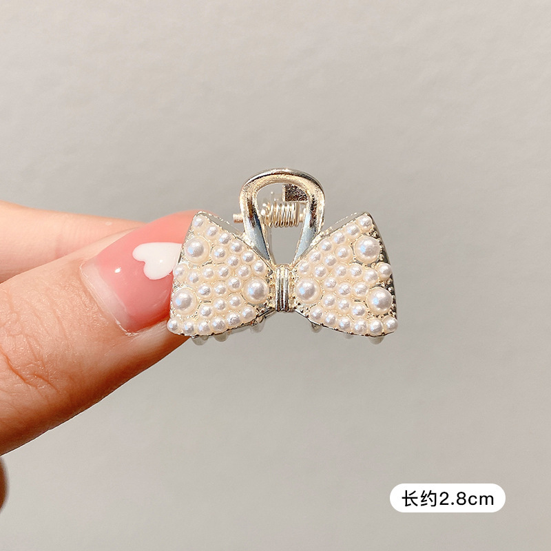 Pequeñas pinzas de cabello de perla temperamento feminino medio agarrado pinzas de cabello de borde pequeño adornamiento de cabeza de alto nivel no lastimar pinzas de cabello