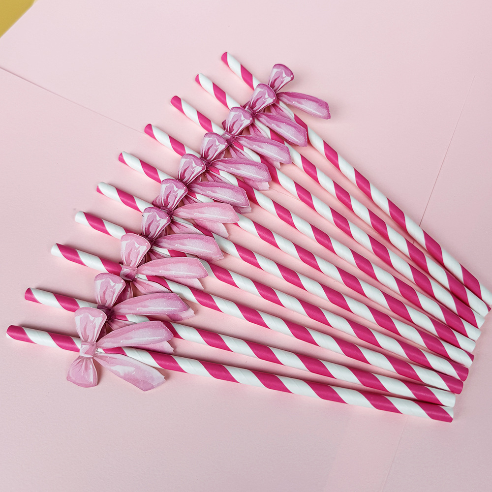 Suministros para fiestas transfronterizas Pajitas de lazo creativas Pajitas de papel desechables Pajitas de jugo de frutas Spot al por mayor