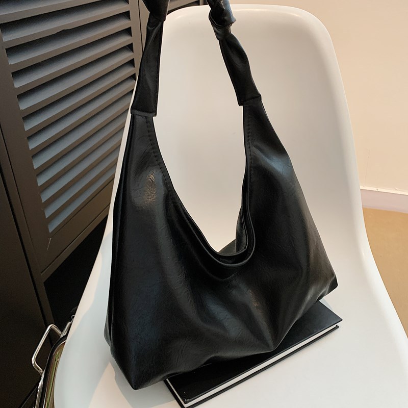 Bolsa de gran capacidad para viajar al trabajo Otoño / Invierno 2024, nueva bolsa de hombro de moda retro simple bolsa de abrigo casual